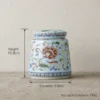 blue floral pattern tea jar with measurments