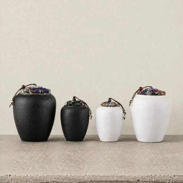 all 4 black and white flower lid jars
